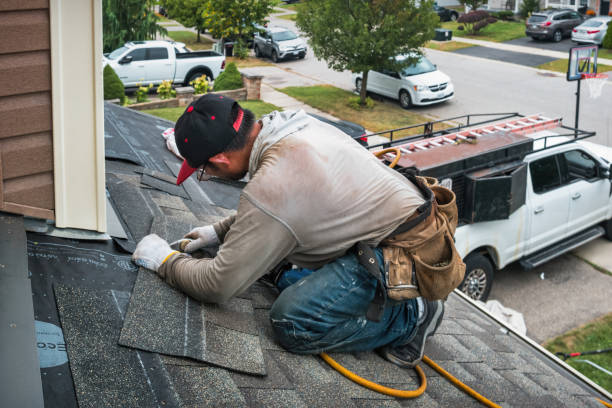 Professional Flat Roof Repair technician working in Irons, MI